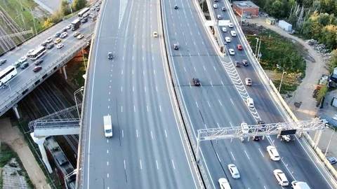 Hyperlapse traffic on the high-speed highway from altitude in clear weather Stock Footage 116234558