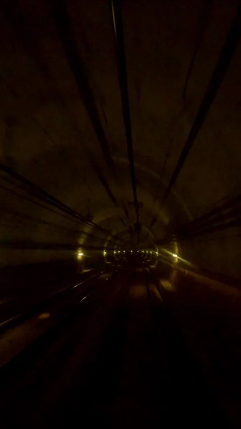 Hyperlapse of train moving to tunnel of metro, Vertical video, POV Stock Footage 266697492