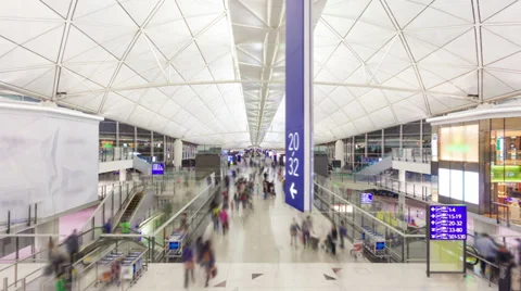 Hyperlapse video of commuters in an airport Stock Footage 34838973