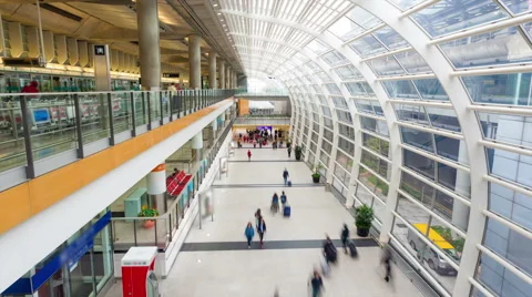 Hyperlapse video of commuters in an airport Stock Footage 41860689