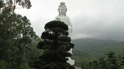Hyperlapse video of Giant bronze-cast white Guan Yin Stock Footage 52765691