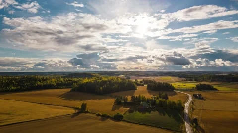 Hyperlapse video of rural landscape with cloudy sky. Stock Footage 210751005