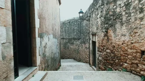 Hyperlapse video of someone walking by the old town of Girona Stock Footage 231311850