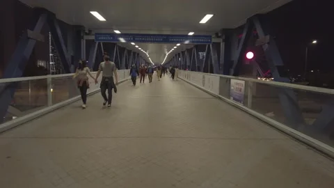 Hyperlapse view of Busy crowd on footbridge Stock Footage 150286964