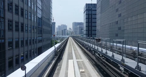Hyperlapse view from front of electric train in Odaiba Tokyo at mid day Stock Footage 111149742