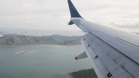 Hyperlapse view from the plane window with view of plane wing and landscape Stock Footage 119268865
