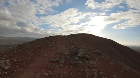 Hyperlapse walking down a Vulcano with a dramatic sunset sky Video stock 175676626