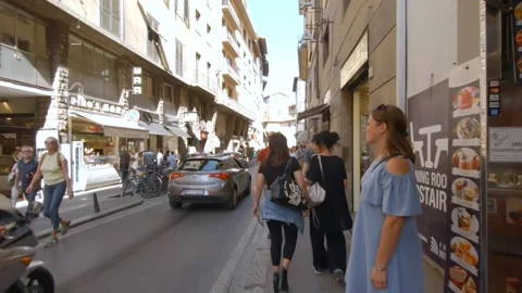 Hyperlapse Walking Footage towards Ponte Vecchio with Tourists - Florence, Italy Stock Footage 139531353