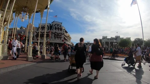 Hyperlapse walking though the crowds at Main Street USA in Magic Kingdom Stock Footage 100280141