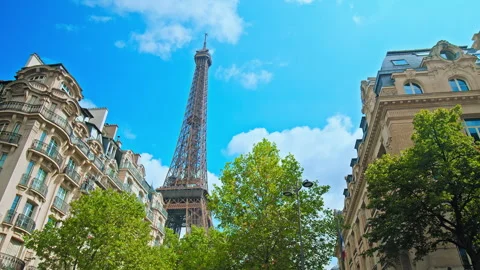 Hyperlapse of the wrought-iron lattice Tower between buildings. Stock Footage 245460839