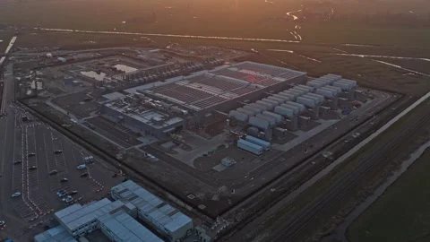 Hyperscale ai data center with solar panels at sunrise Stock Footage 332849935