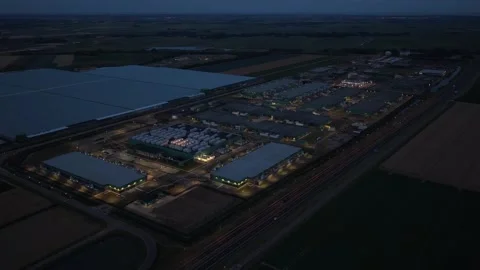Hyperscale data center powering artificial intelligence at night Stock Footage 340349997