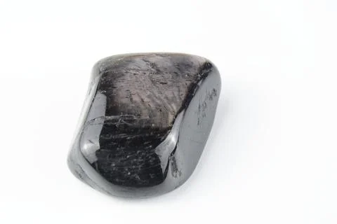 Hypersthene gemstone on white background Stock Photos