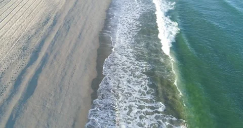 Hypnotic and Relaxing Waves Rolling Towards the Shore Stock-Footage 324752217