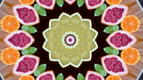 Hypnotic caleidoscope abstract pattern motion background - fruit citrus pattern Stock Footage 136492523