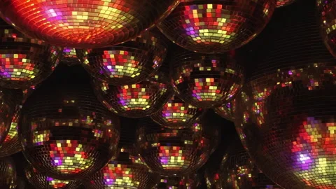 Hypnotic Dance of Light Across a Multitude of Shimmering Disco Spheres Stock Footage 334926817