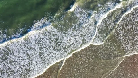 Hypnotic drone footage of St Augustine Beach Waves from Above Stock Footage 114201056
