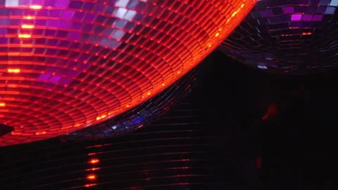 Hypnotic Glow of Multiple Disco Balls Creates Party Magic Stock Footage 334927923