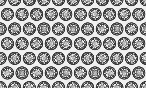 Hypnotic grayscale pattern featuring repeating circular motifs.  Perfect for  Illustrazione stock