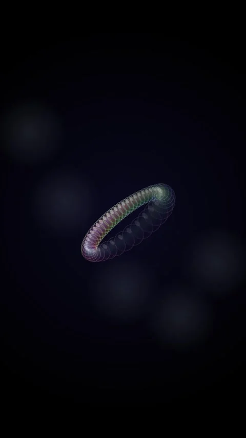Hypnotic iridescent quantum vortex ring animation against black backdrop Stock Footage 345491059