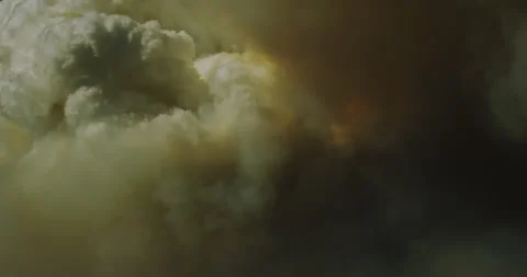 Hypnotic pyrocumulus clouds lend apocalyptic beauty to a raging wildfire. Video stock 325488932