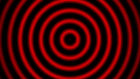 Hypnotic red concentric circles expanding outwards on black background seam.. Stock Footage 334829637