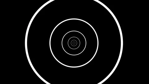 Hypnotic white concentric circles zooming into an infinite black tunnel loop. Stock Footage 308929148