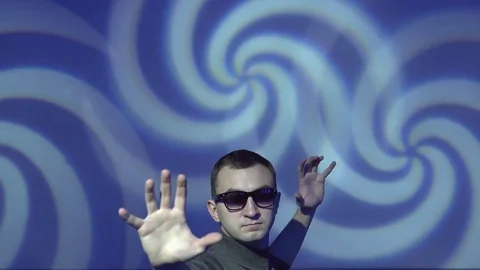 Hypnotist brainwashing the viewer into a deep subconscious subliminal trance Stock Footage