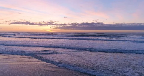 Hypnotizing and Relaxing Ocean Sunset and Waves Crashing at the Tranquil Beach Video stock 123203689