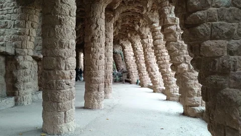 Hypostyle hall with doric columns  in the famous Park Guell Stock Footage 328171061