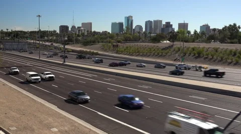 I-10 freeway timelapse of traffic with downtown Phoenix, Arizona Stock Footage 61221736
