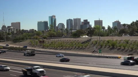 I-10 freeway traffic with downtown Phoenix, Arizona Stock Footage 61221766