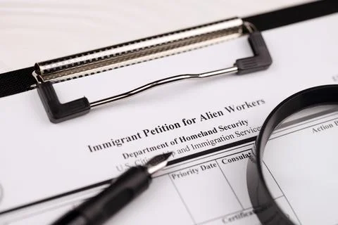 I-140 Immigrant petition for alien workers blank form on A4 tablet lies on .. Stock Photos