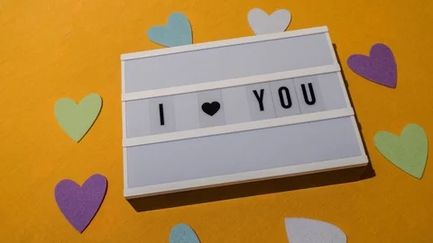 "I <3 you " sign displayed on a lightbox Stock Footage 85908792