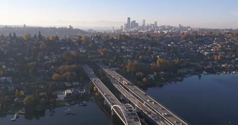 I-90 Floating Bridge over Lake Washington with Seattle Skyline Autumn Aerial Видео 332249471