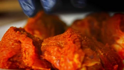 I add spices to beef and duck. 4k video Stock Footage 157181721