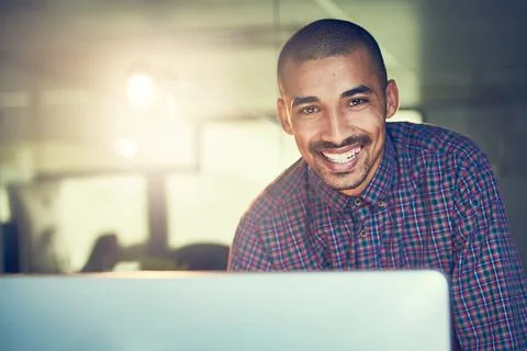 I always meet my commitments. Portrait of a young designer working late in an Foto stock