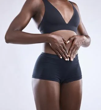 I am beautiful both inside and out. Studio shot of a woman forming a heart shape Stock Photos