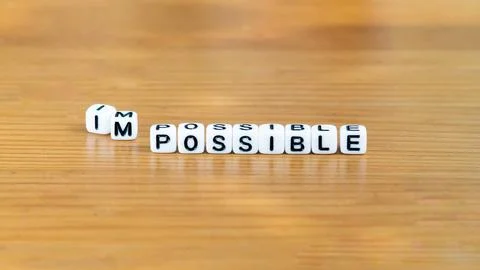 I am possible impossible slogan in white bead letters. Motivation inspiration Stock Photos