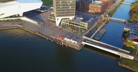 The I amsterdam letters on the quay by the EYE Filmmuseum Vídeos de archivo 71295983