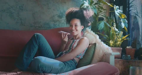 I can chat all day from the comfort of my couch stock video Stock Footage 218368736
