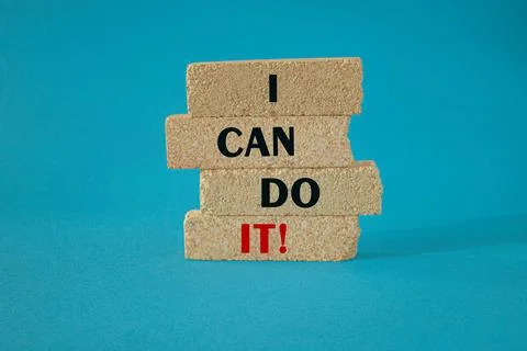 I can do it symbol. Concept words I can do it on brick blocks. Stock Photos
