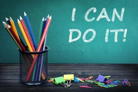 I can do it text on green board Stock Photos