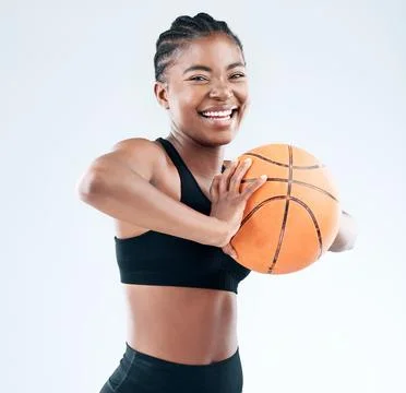 I can do more than just throw a ball. Studio shot of a sporty young woman posing Stock Photos