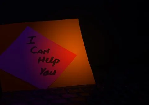 I can help you wrote on a card at the office Hold The Hand Foto stock