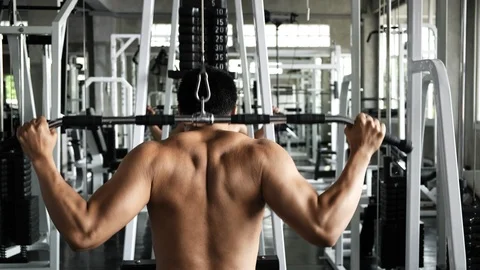 I can take this lat pulldown easy. Stock Footage 103438578