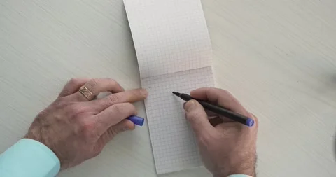 I Can  - this word is written on the sheet by a man's hand Stock Footage 267084159