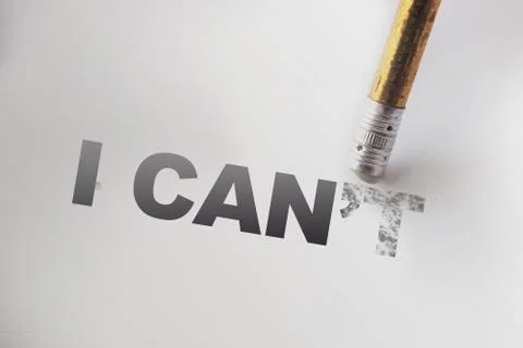 I can't to I can Changing phrase words with a pencil eraser. Self motivation  库存照片