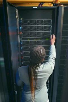 I cant seem to find the problem. an unrecognizable IT specialist standing and 写真素材