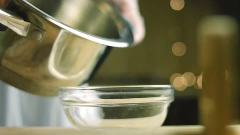I cook coca syrup and brown sugar. Boil all ingredients Stock Footage 165352488